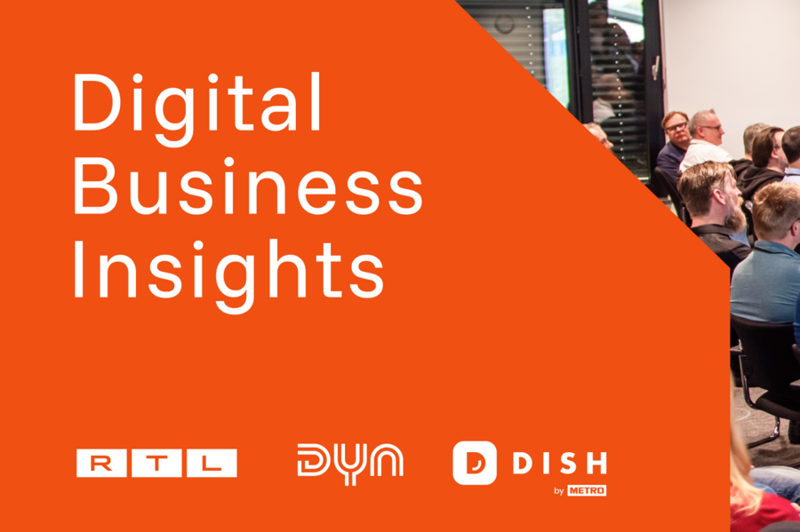 Publikum bei einer Fachveranstaltung, während ein Sprecher eine Präsentation hält.