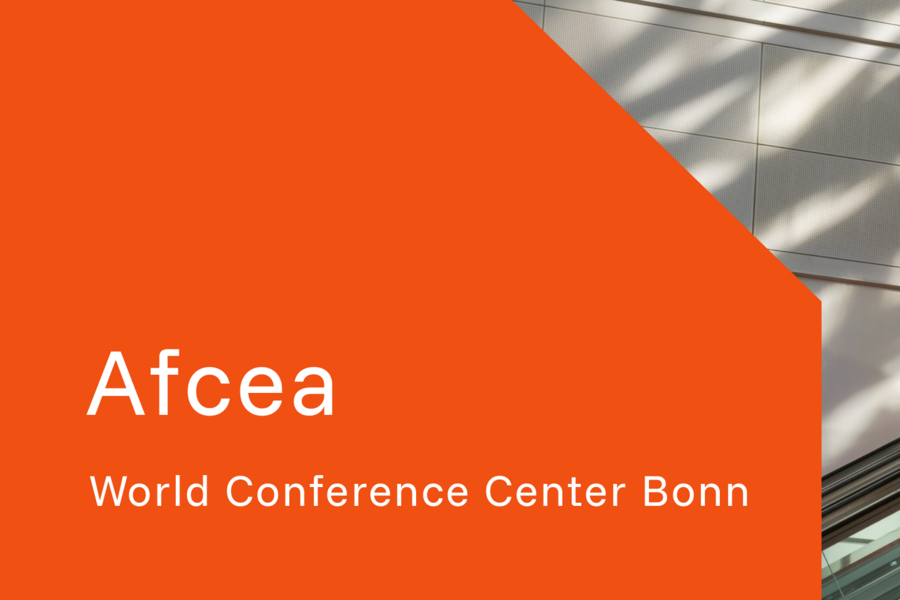 Person on escalator at conference.