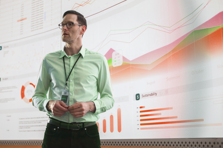 Man presenting data charts.
