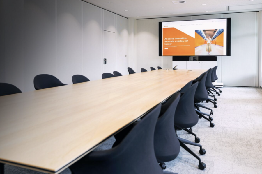 Empty conference room with a long table.