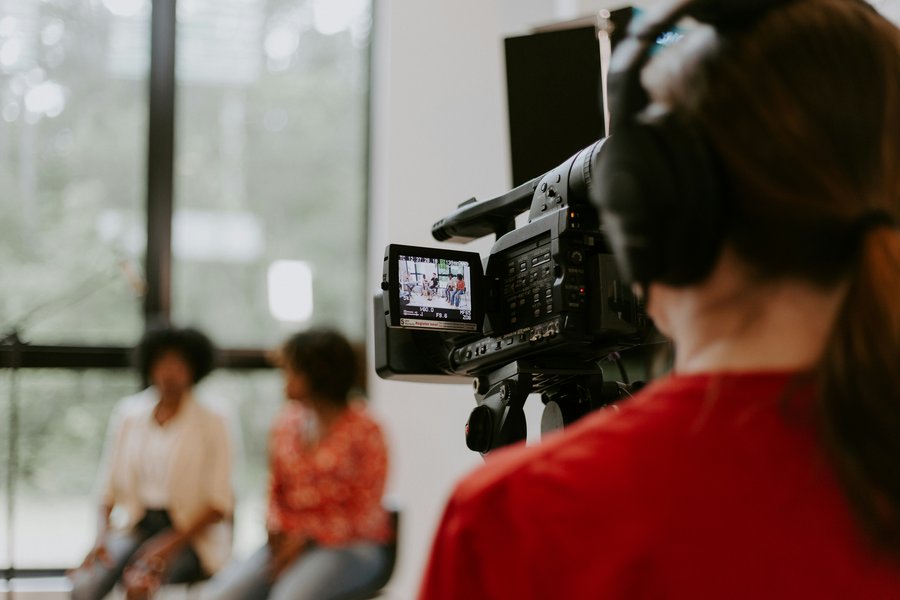 Camera recording of an interview with two women.