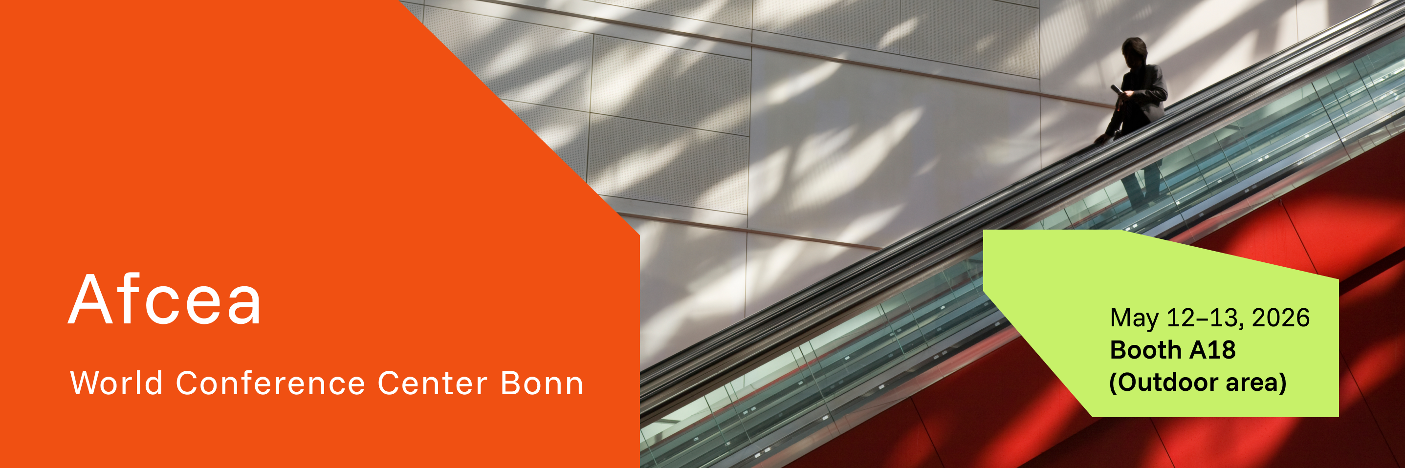 Person on escalator at conference.